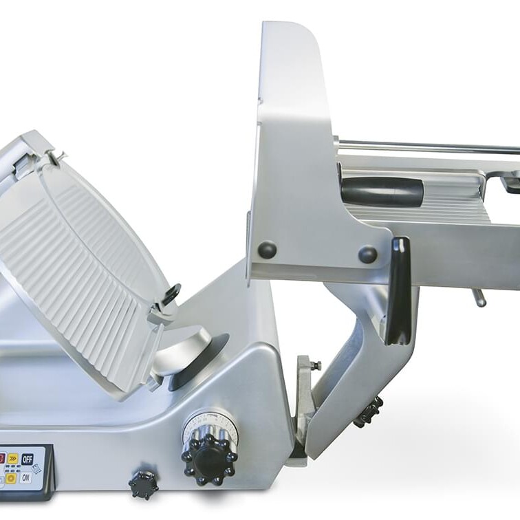 330 IK SA US- Manconi USA  Kolossal automatic gravity feed slicer